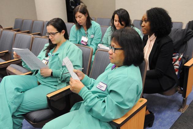 Nurses sitting on chairs