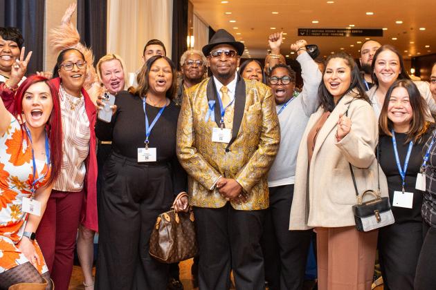 Stephen Bradshaw, one of this year’s Humanitarian Award recipients and a paraprofessional at MS 217 in Queens, is celebrated by all the paraprofessionals at his school at the 2025 UFT Paraprofessionals Awards Luncheon on March 22, 2025. 
