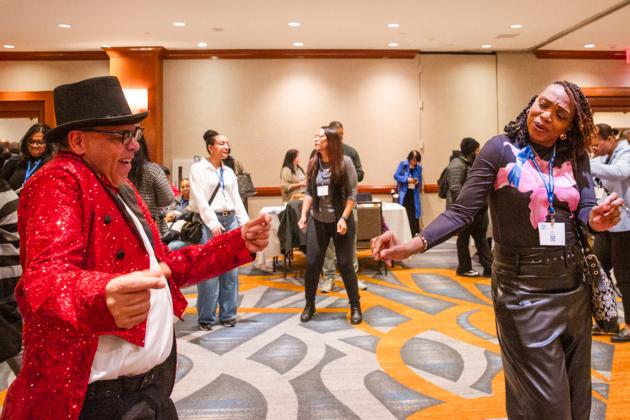 Two colleagues dance together at the UFT Paraprofessional Awards Luncheon on March 7, 2026. 