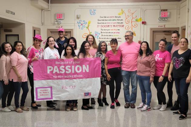 Teachers pose for Pink Day