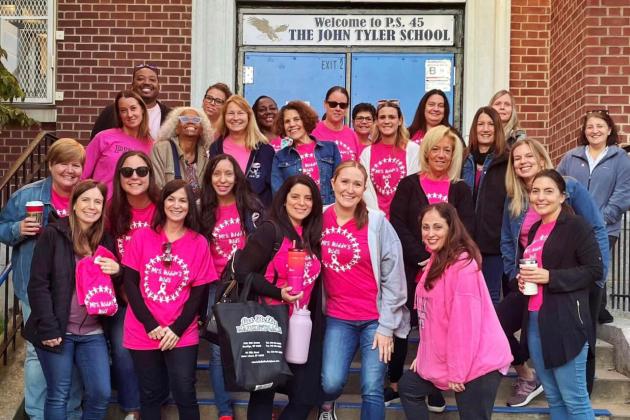 Staffers at PS 45 on Staten Island wear pink in memory of Denise Budde, a prekindergarten teacher and chapter leader who died of breast cancer in 2019. 
