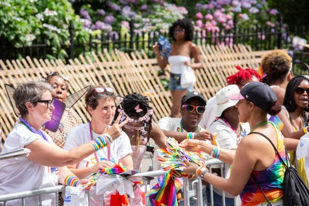 UFT members interact with the crowd at the 2025 NYC Pride March. 