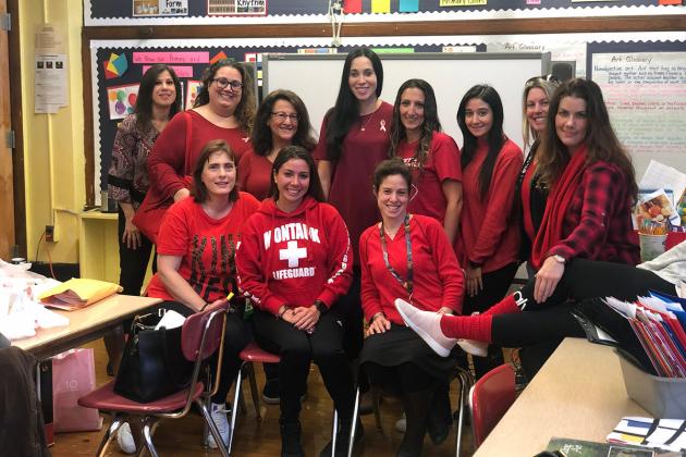 Group of UFT members wearing red