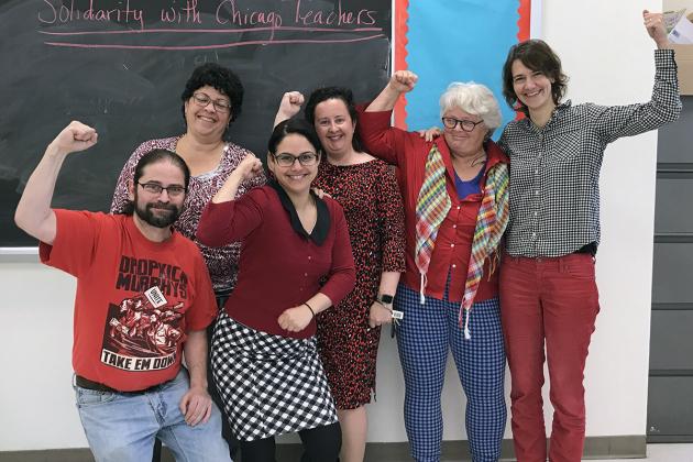 Group of UFT members wearing red