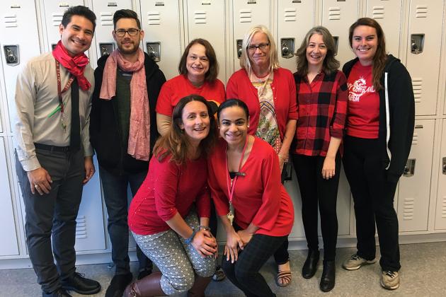 Group of UFT members wearing red