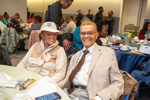A retired paraprofessionla and her brother, a retired school cafeteria worker, take a photo at the UFT Retired Teachers Chapter Luncheon on May 23, 2025. 