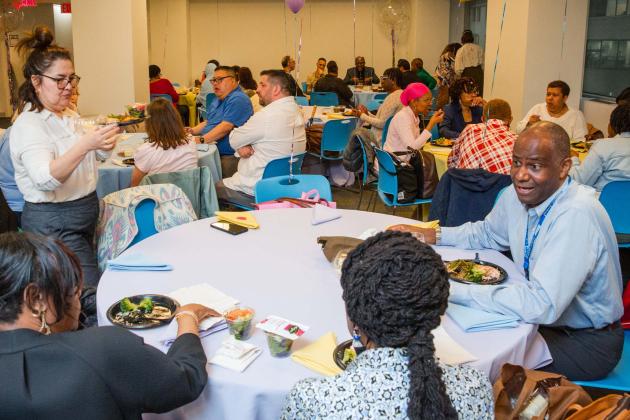 School nurses network and catch up with one another during dinner.