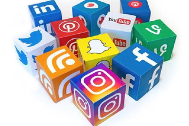 Cubes covered in social media logos