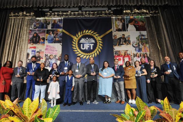 High school chapter leaders gather are congratulated for winning Ely Trachtenberg Awards by UFT Vice President for Academic High Schools Janella Hinds (left) and UFT Vice President for Career and Technical Education Leo Gordon (right).