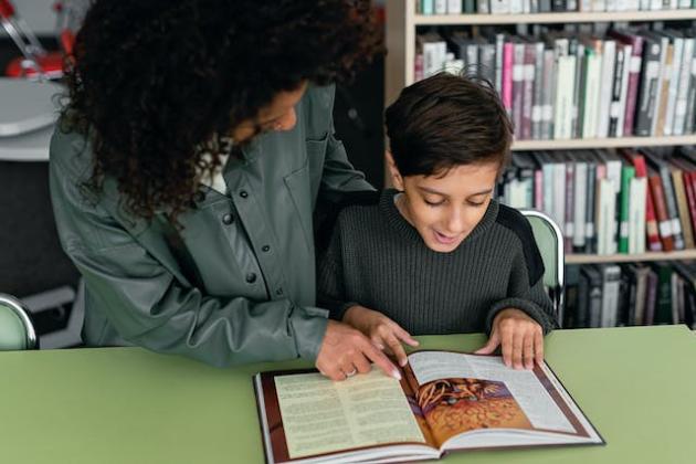 Teacher reading with student - generic
