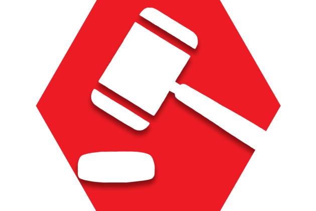 Red hexagon with outline of gavel