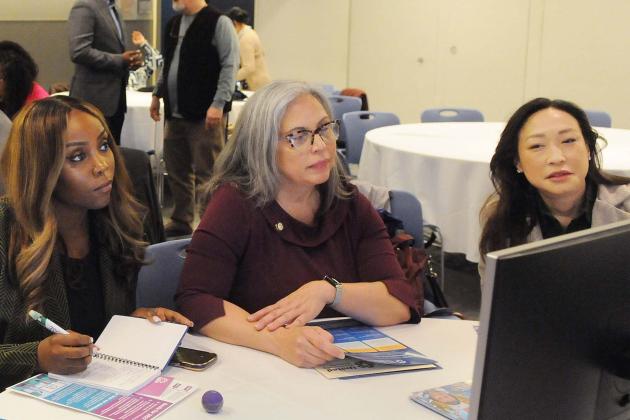 City Council members get information on NYC Childcare Navigator during a UFT mini “class” at the annual legislative breakfast.