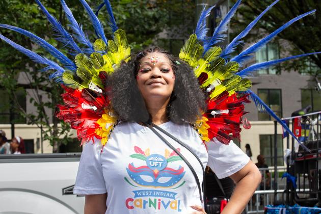 A UFT member in attendance at the West Indian Day Parade in Brooklyn shows off her outfit. 