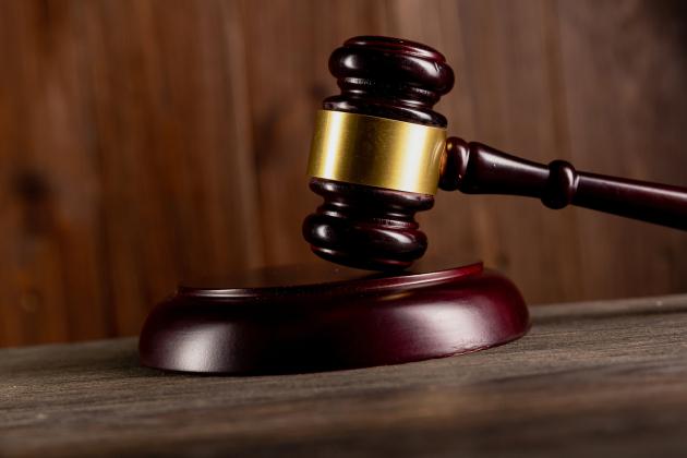 Wooden gavel on desk - Generic