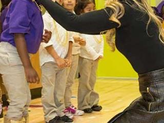 Karen Rattner, the guidance counselor for both PS 349 and MS 358, readies a stud