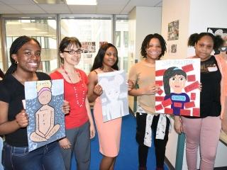 Judith Nersesian (second from left) stands with student artists from Brooklyn’s 