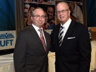 Geof Sorkin, the new director of the UFT Welfare Fund, congratulates Cogen winne