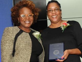 UFT Vice President for Academic High Schools Janella Hinds (left) poses with Out