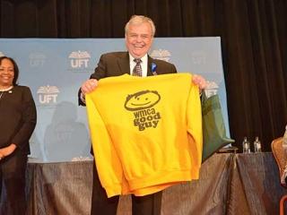 Mel Aaronson shows off the WMCA radio Good Guy sweatshirt.