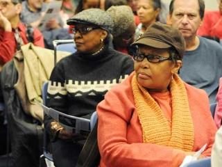 Jean Guy listens to the information.