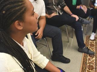 Alex Corbitt (second from right, top photo) listens as students in his Teen Acti