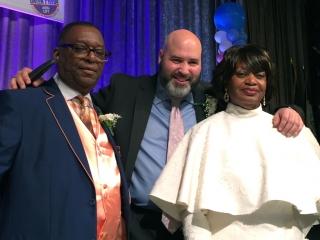 Chapter Leader Shelvy Young-Abrams celebrates with Reginald Colvin (left), the f