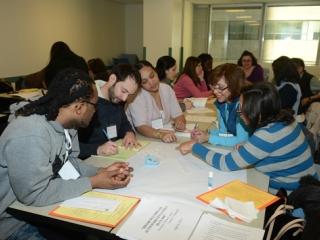 Workshop participants collaborate during an activity.