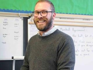 Teacher Michael Carlson developed the Huddle program at PS 107 in Brooklyn.