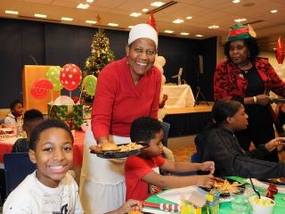 Paraprofessional Margaret Ward of PS 146, Brooklyn, joins other volunteers servi