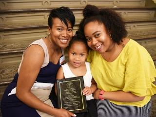 Honoree Dina Colon (left), a guidance counselor in the Pathways to Graduation pr