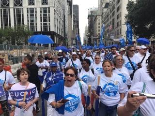 UFT members march down Fifth Avenue.