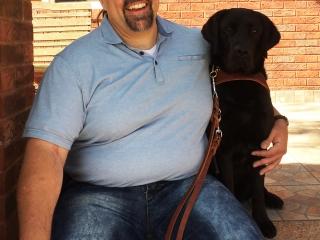 Vision Education Services Chapter Leader Vincent Pedulla with his new guide dog.