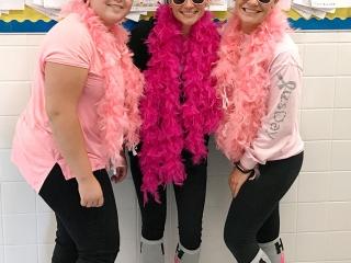 Members from PS 110 in Queens in boas and shades.