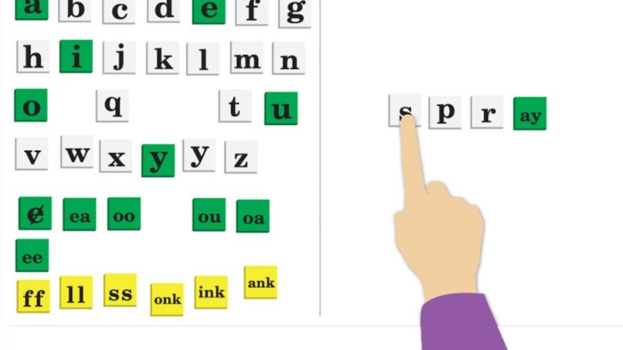 Letters with some covered. Finger pointing to one letter.