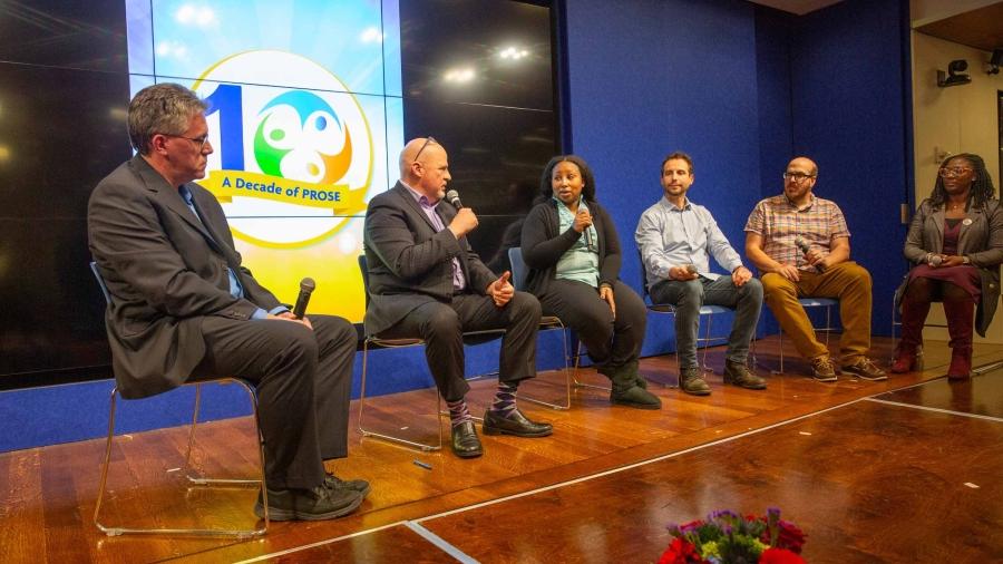 People talking on stage