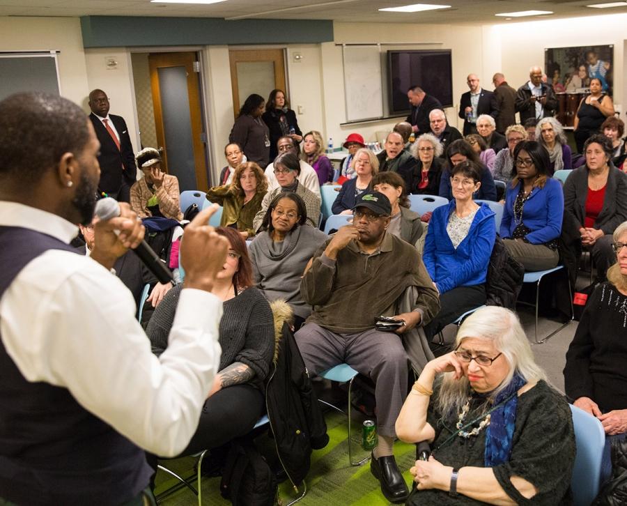 The Manhattan town hall drew a standing-room-only crowd.