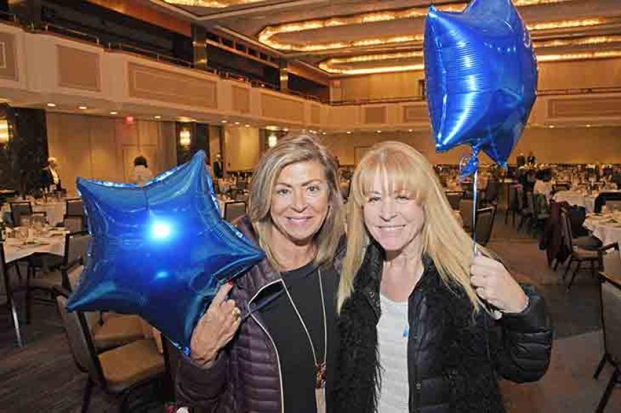 Joan Franzese (left) and Hadassah Rosenman show off the balloons they received a