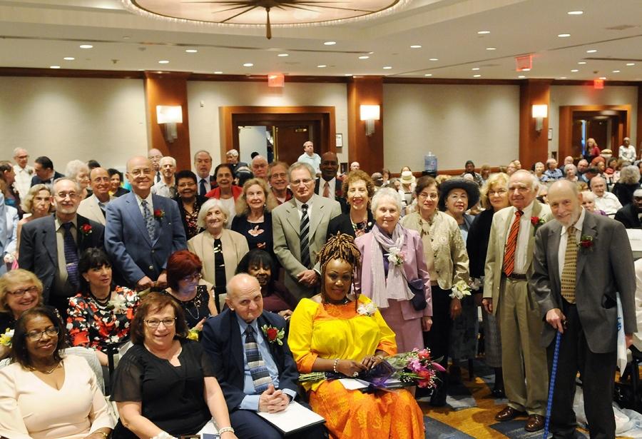 Retirees boasting 50- and 60-year UFT membership rise to be recognized.