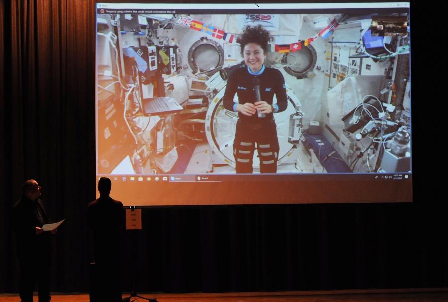 An astronaut is on a live stream from the International Space Station, asking questions from students at Van Buren HS.