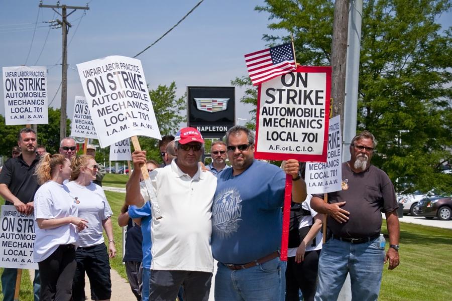 Men holding strike signs