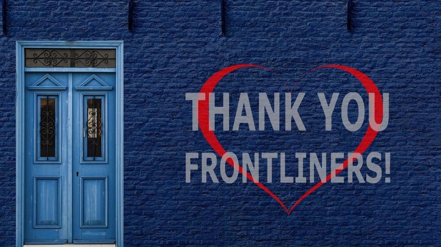 Painted wall with sign, Thank you Frontliners inside of a heart