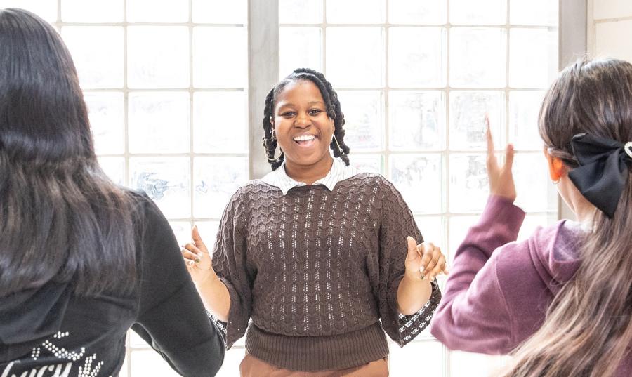 Laeticia Charles leads students in an extracurricular dance program. Charles opens each  rehearsal with an emotional check-in, allowing her students an often needed reset.