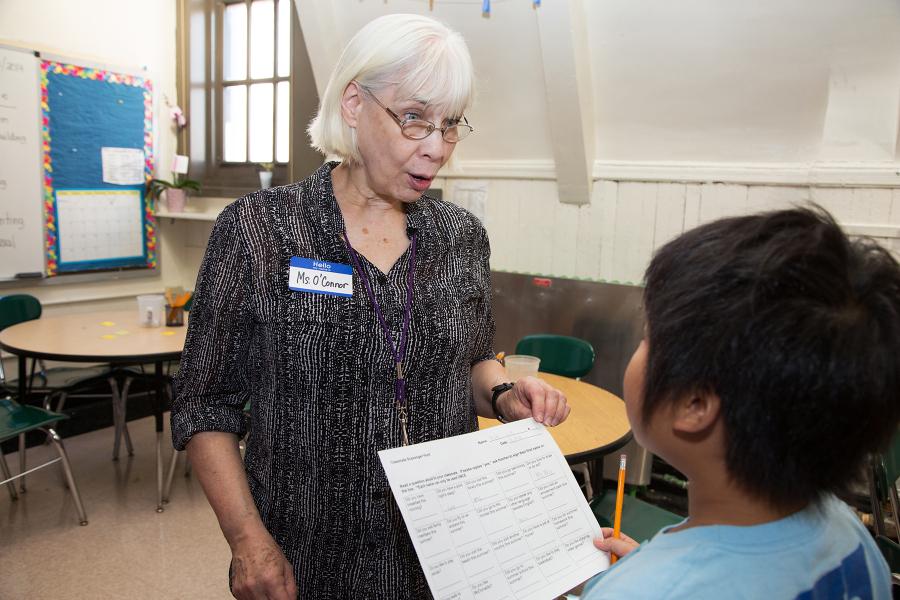 Mature women talks to student