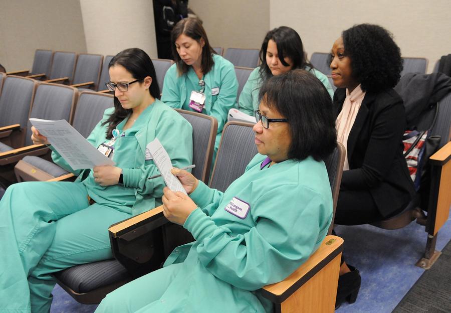 Nurses sitting on chairs
