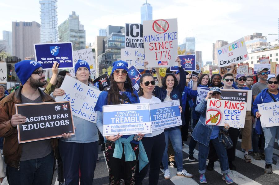 Members from Central Park East II in Manhattan (left, foreground) prepare to march as part of  the UFT contingent in the No Kings March on Oct. 18.