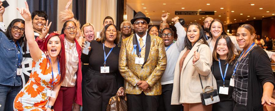 Stephen Bradshaw, one of this year’s Humanitarian Award recipients and a paraprofessional at MS 217 in Queens, is celebrated by all the paraprofessionals at his school at the 2025 UFT Paraprofessionals Awards Luncheon on March 22, 2025. 