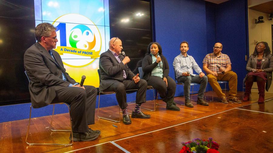 People talking on stage