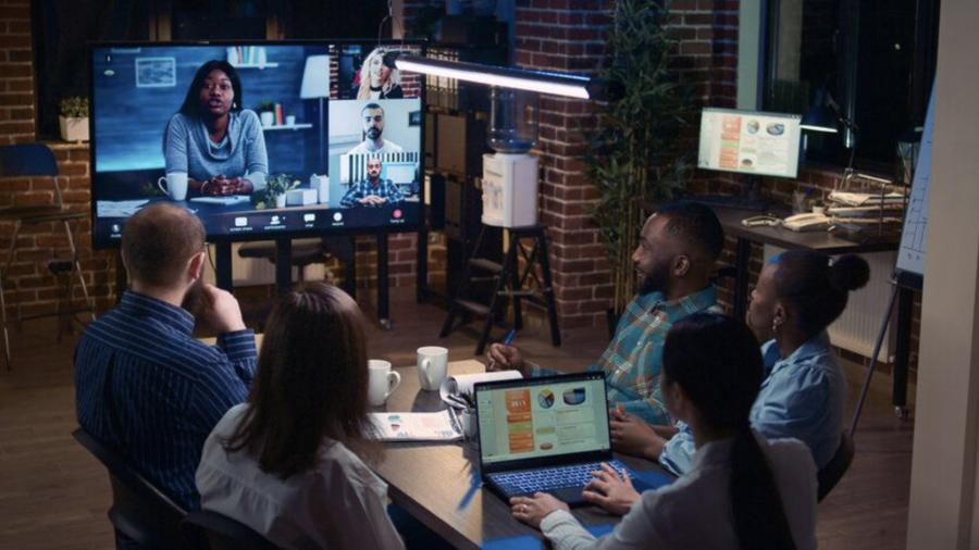 Students in classroom looking at a monitor