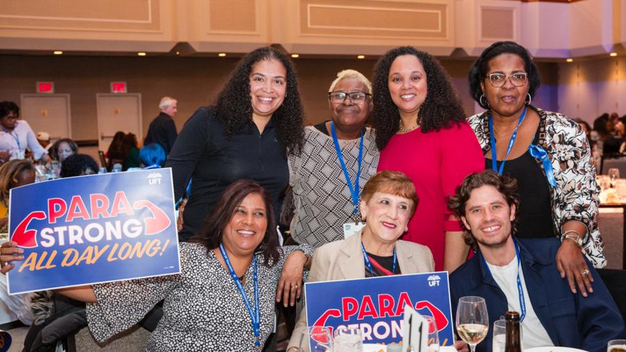 Attendees take a group shot with UFT Paraprofessionals Chapter Chairperson Priscilla Castro at the UFT Paraprofessional Awards Luncheon on March 7, 2026. 