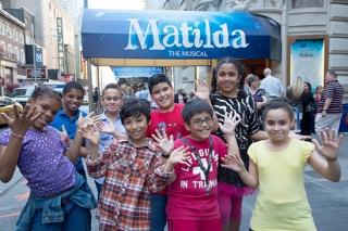 PS 34 students strut their stuff waiting for the theater doors to open.